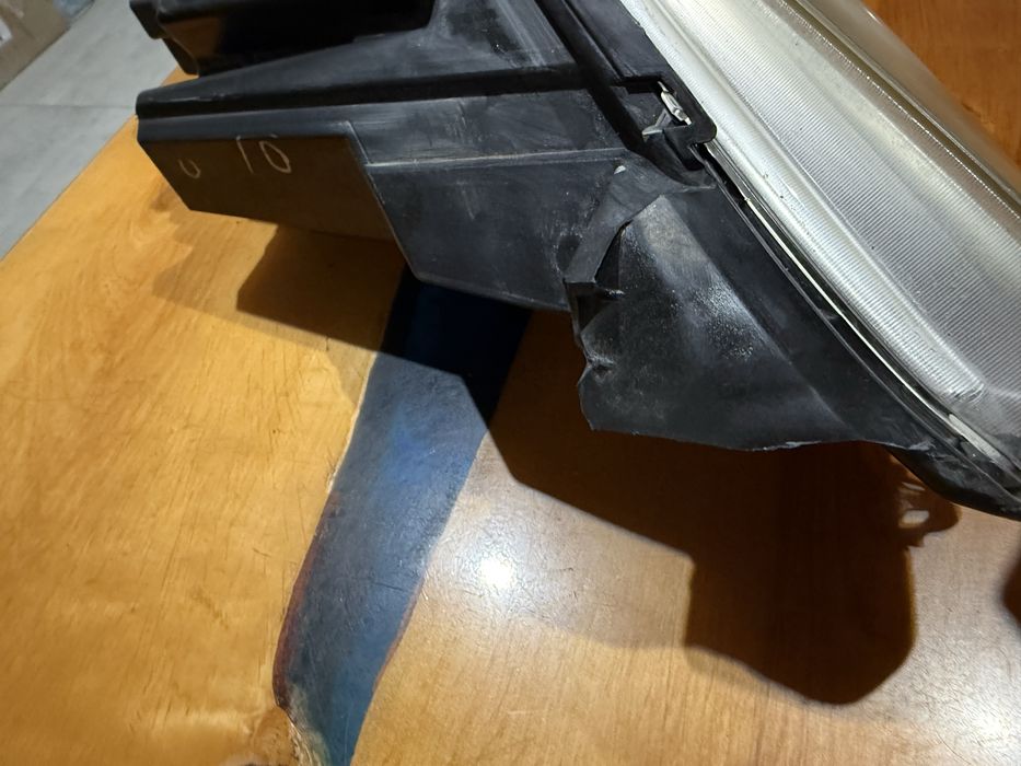 Фара ліва передня модел с 14 рік