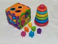 Zabawki edukacyjne, kostka-sorter i kolorowa piramida z kółek