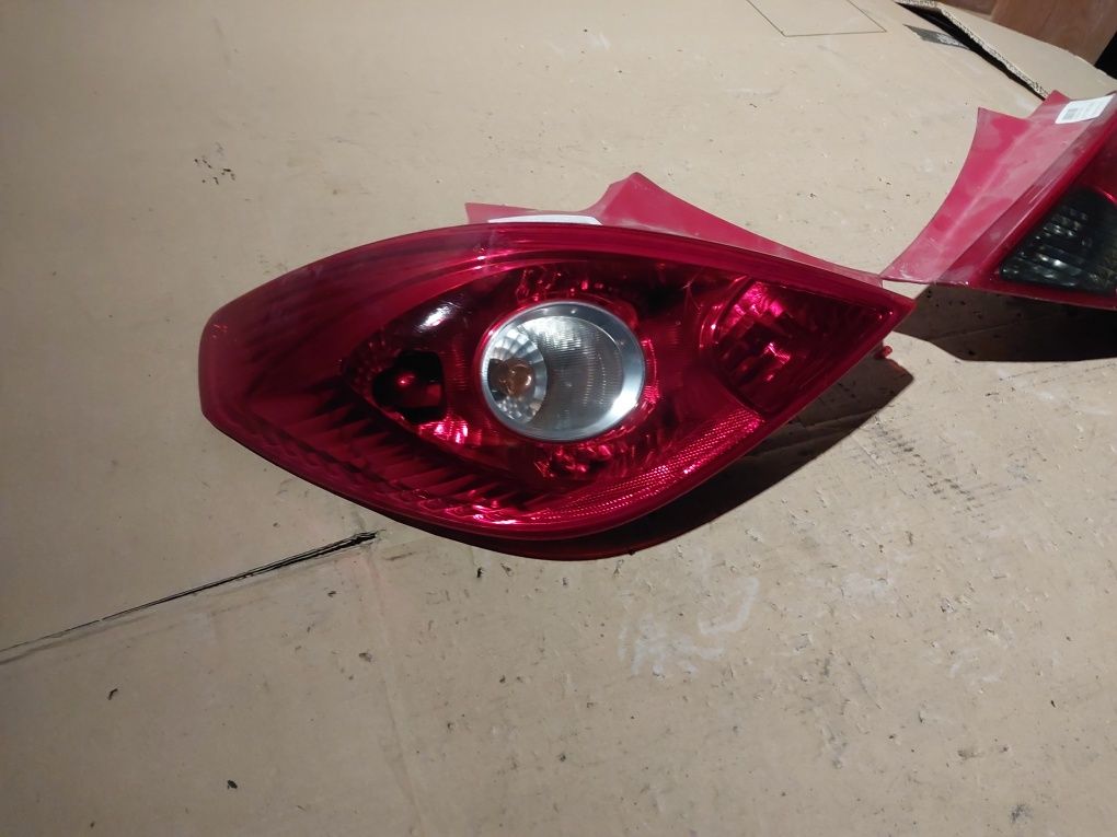 Opel corsa d tylna lampa tył prawa lewa tylna 3 drzwi 3 d