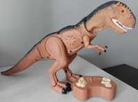 Dinozaur,chodzi, ryczy, świeci, na pilota firmy SMYK