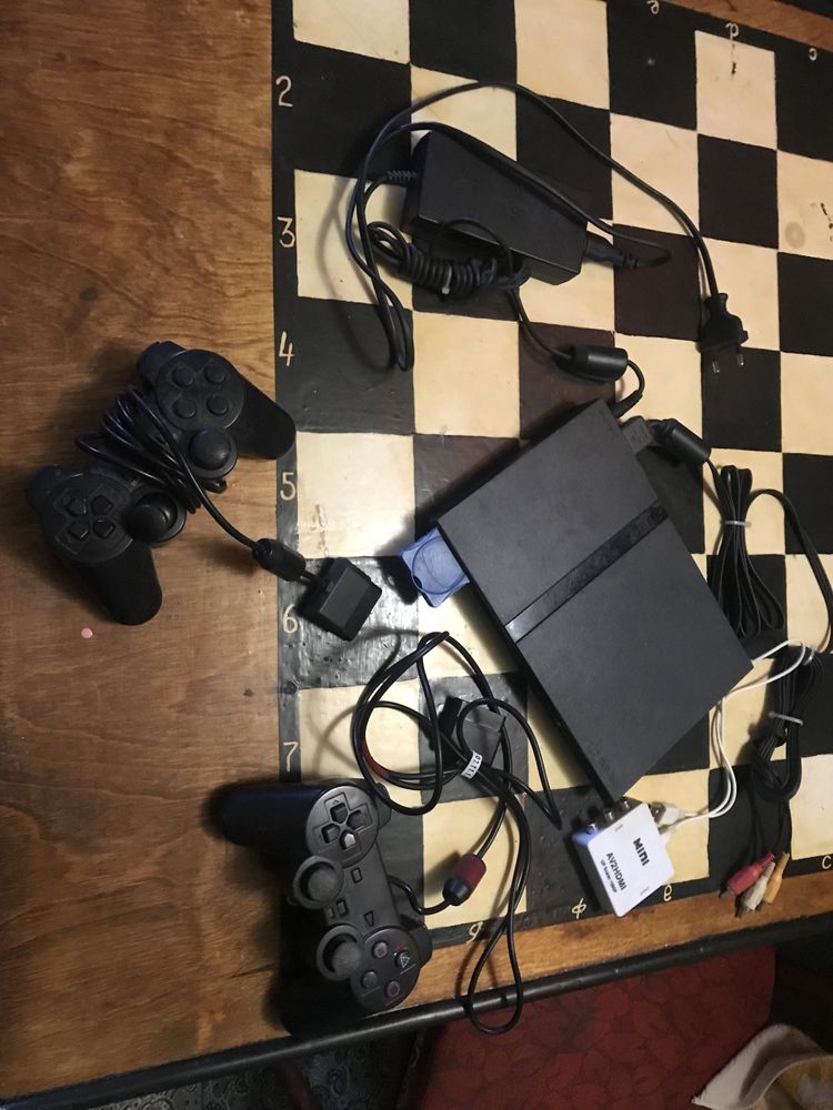 Продам PS2 с играми