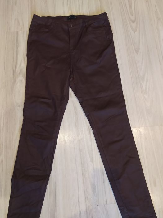 Spodnie damskie mohito woskowane oraz Orsay