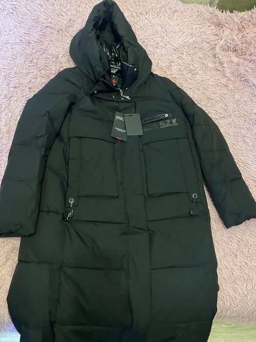 Зимова довга куртка