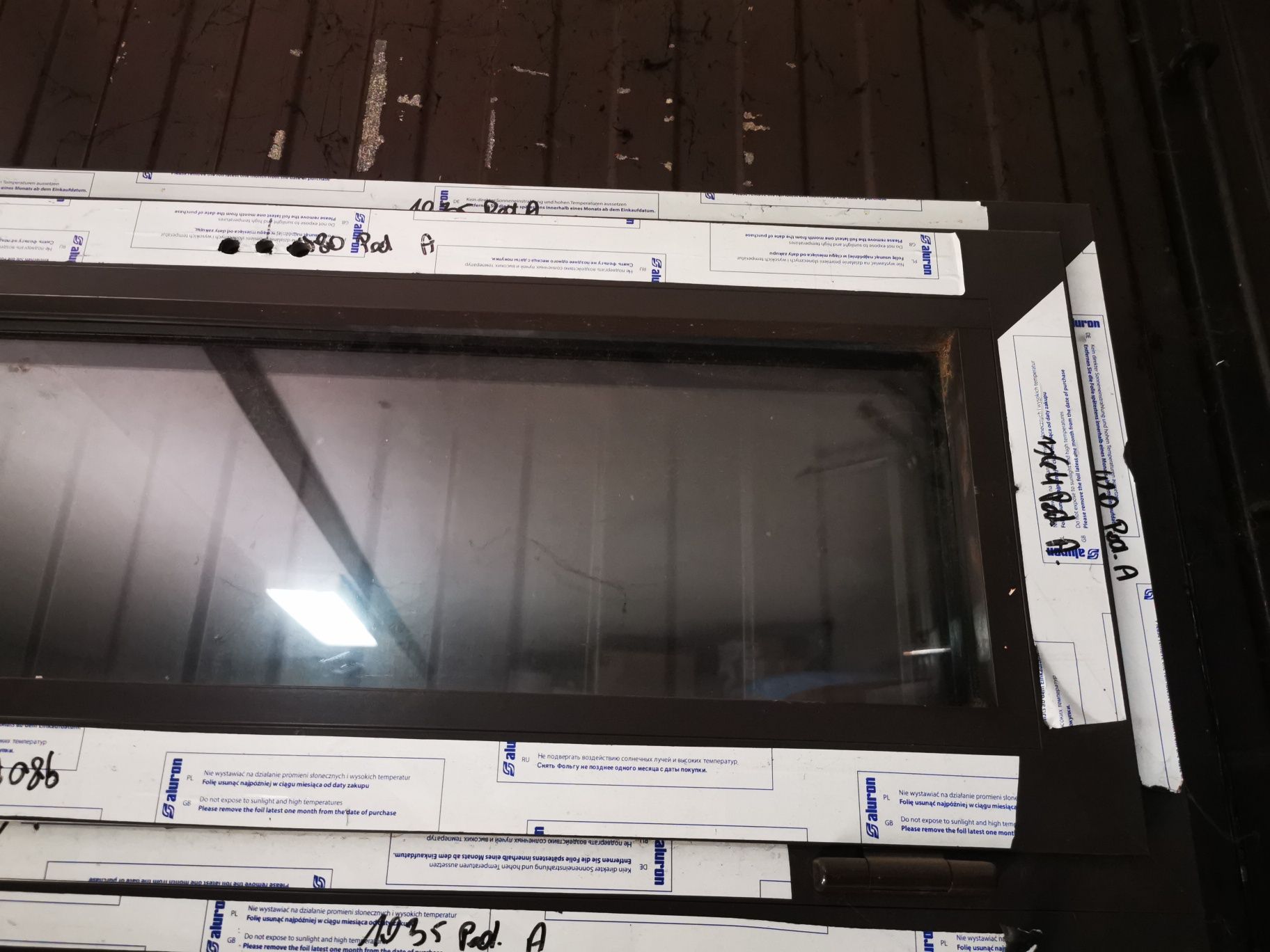 Drzwi aluminiowe zewnętrzne z lufcikiem