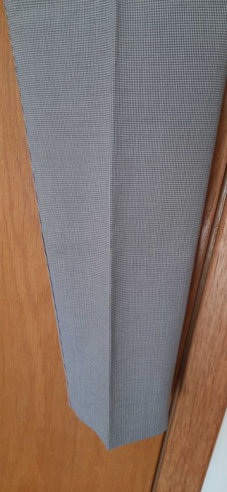 Calças modelo de fato em tecido pied de poule da Zara