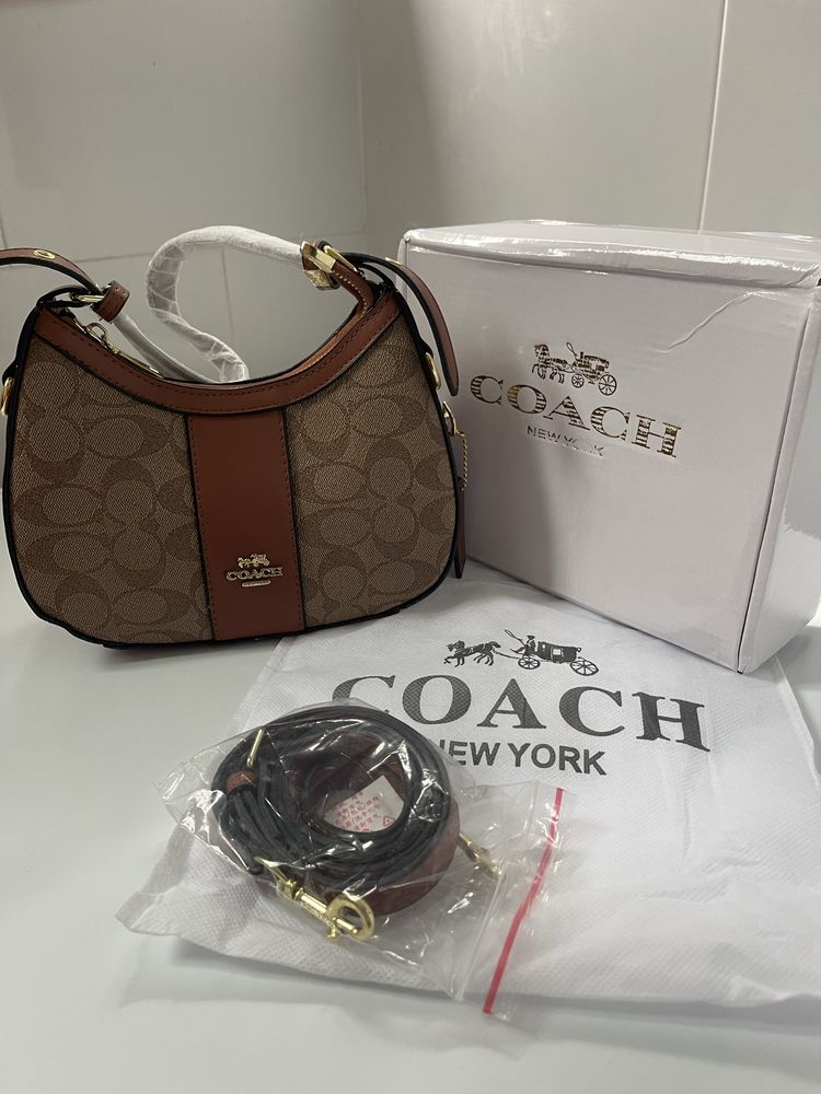 Mala coach nova em caixa