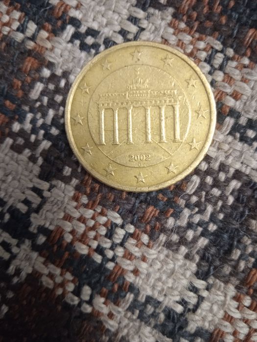 Монета 50 euro cent