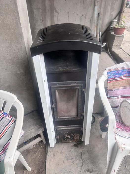 Камін-піч , буржуйка , камін на дрова