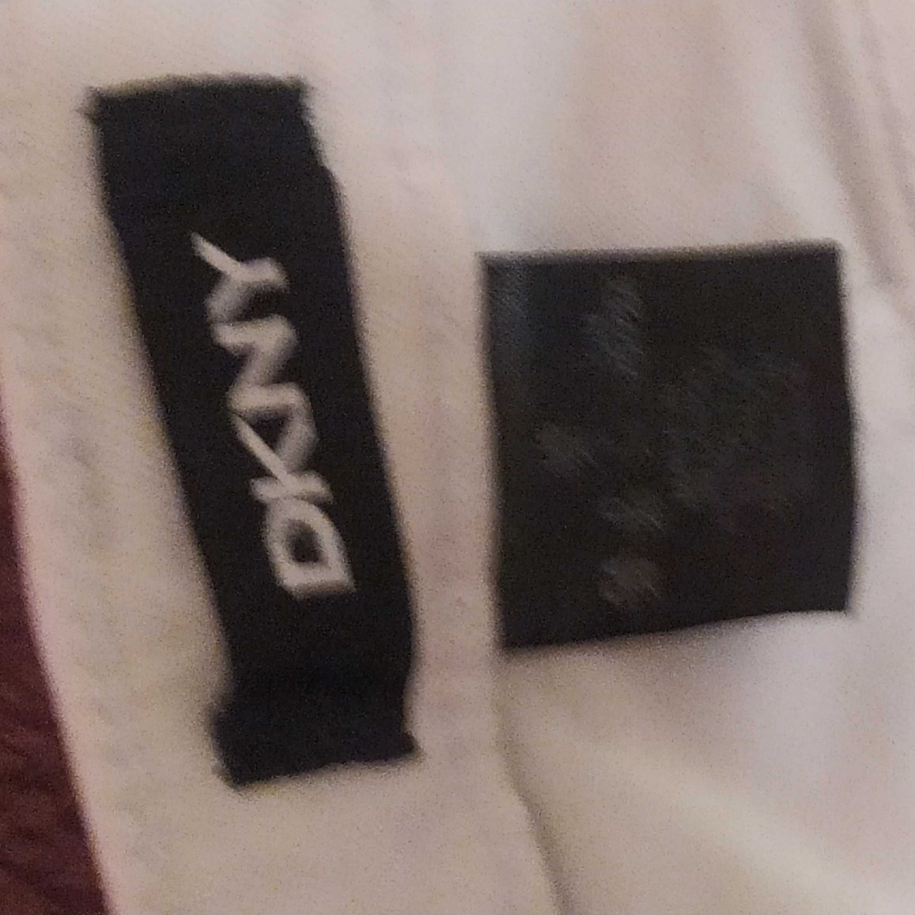 Spodnie jeansy damskie białe DKNY r. 29