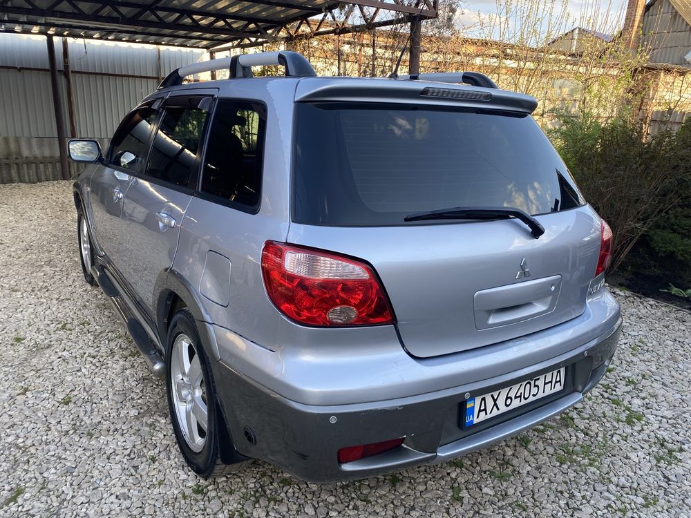 Mitsubishi outlander 2,4 АКПП газ/бензин