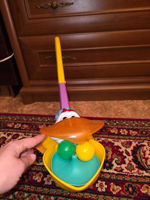 Іграшка музична  каталка Пелікан