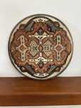 Prato tribal em cobre