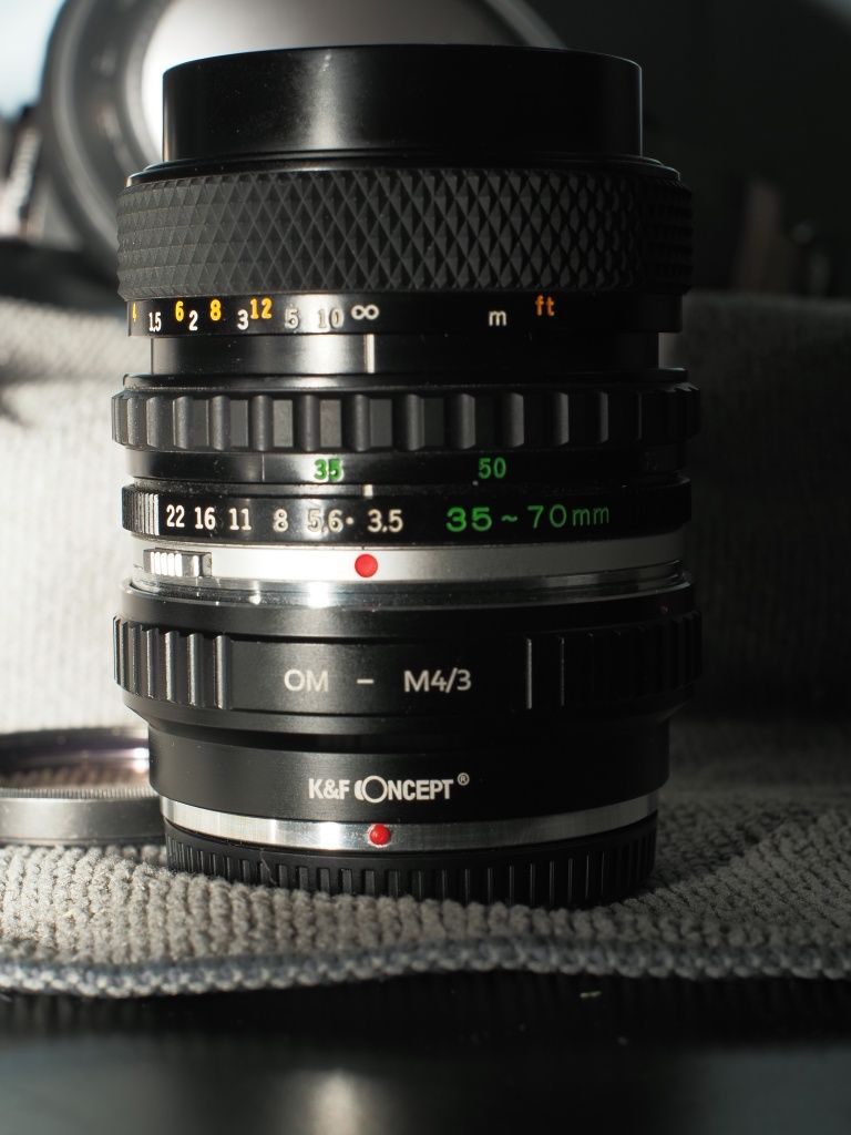 Obiektyw Oly om-system S zuiko auto-zoom 38-70 1:3,5-4,5 + K&F OM-M4/3