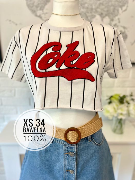 Biały krótki t-shirt typu Crop top Coca Cola w czarne paski Primark Xs