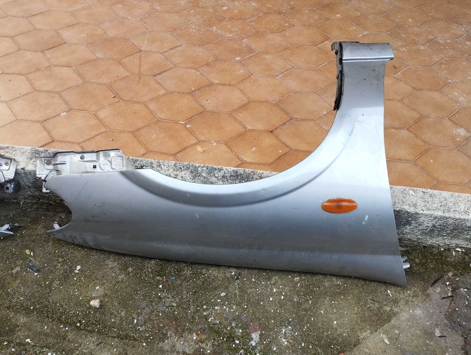 guarda-malas Nissan Almera II hatchback 1.5 dci