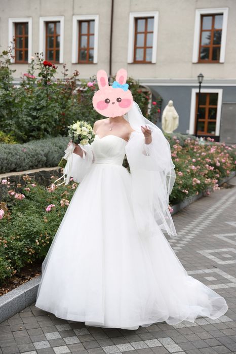 Весільна сукня кольору айворі