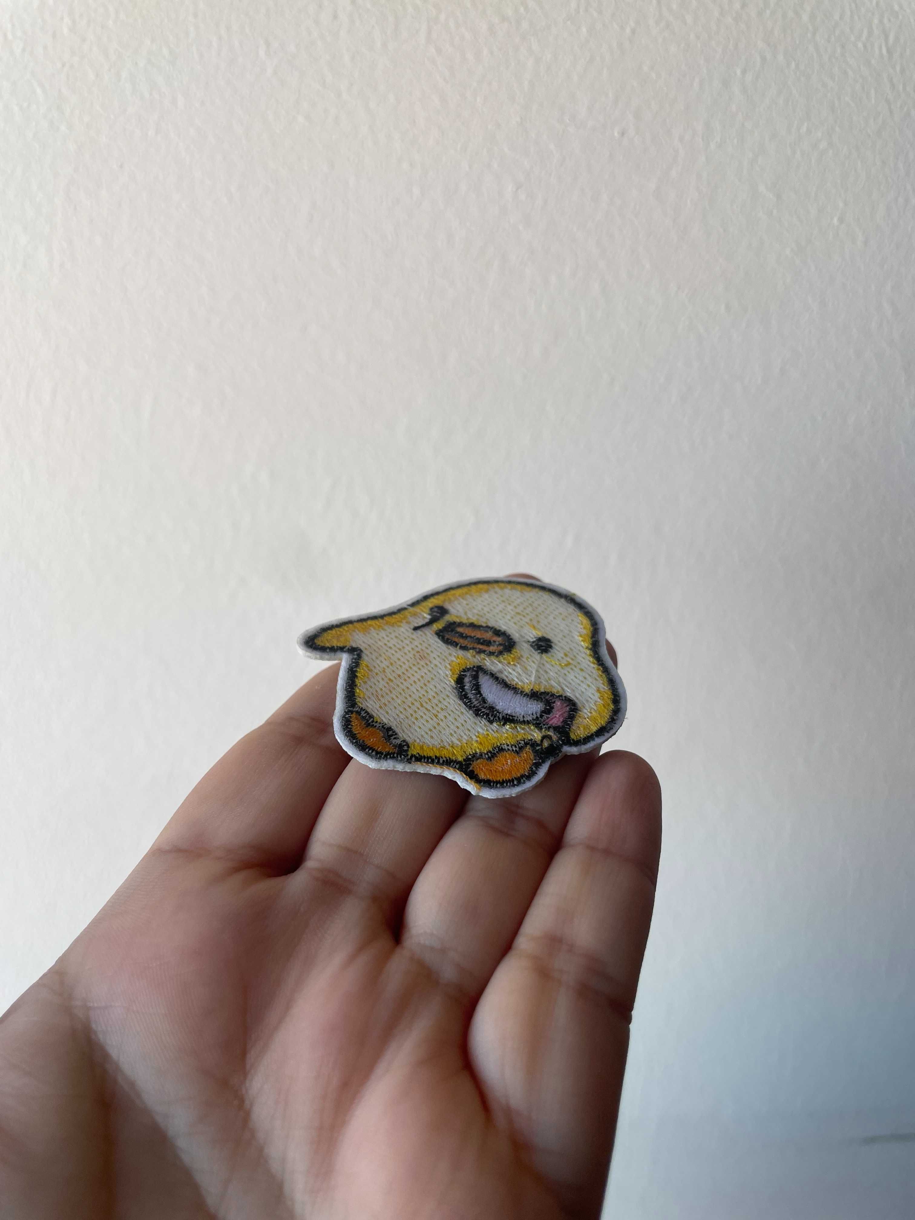 Emblema Duck with Knife