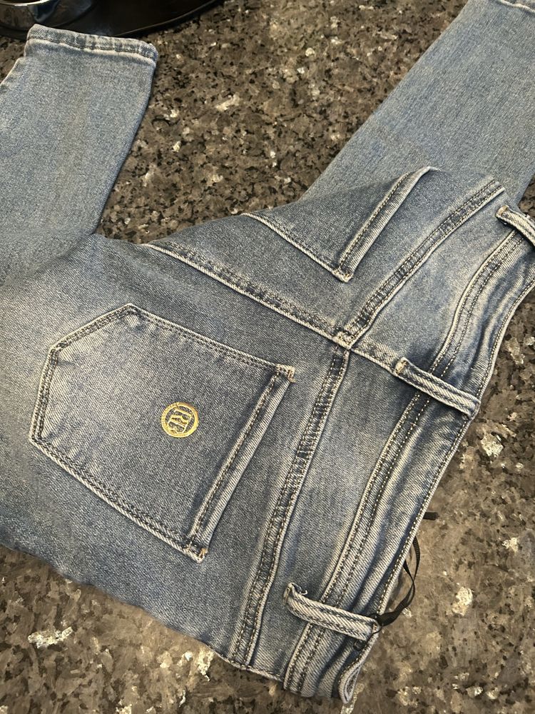 Niwe spodnie jeans RB Roberty Biagi-zlote guziki r.44