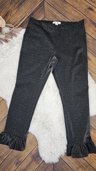 Spodnie damskie z połyskiem r 40 L