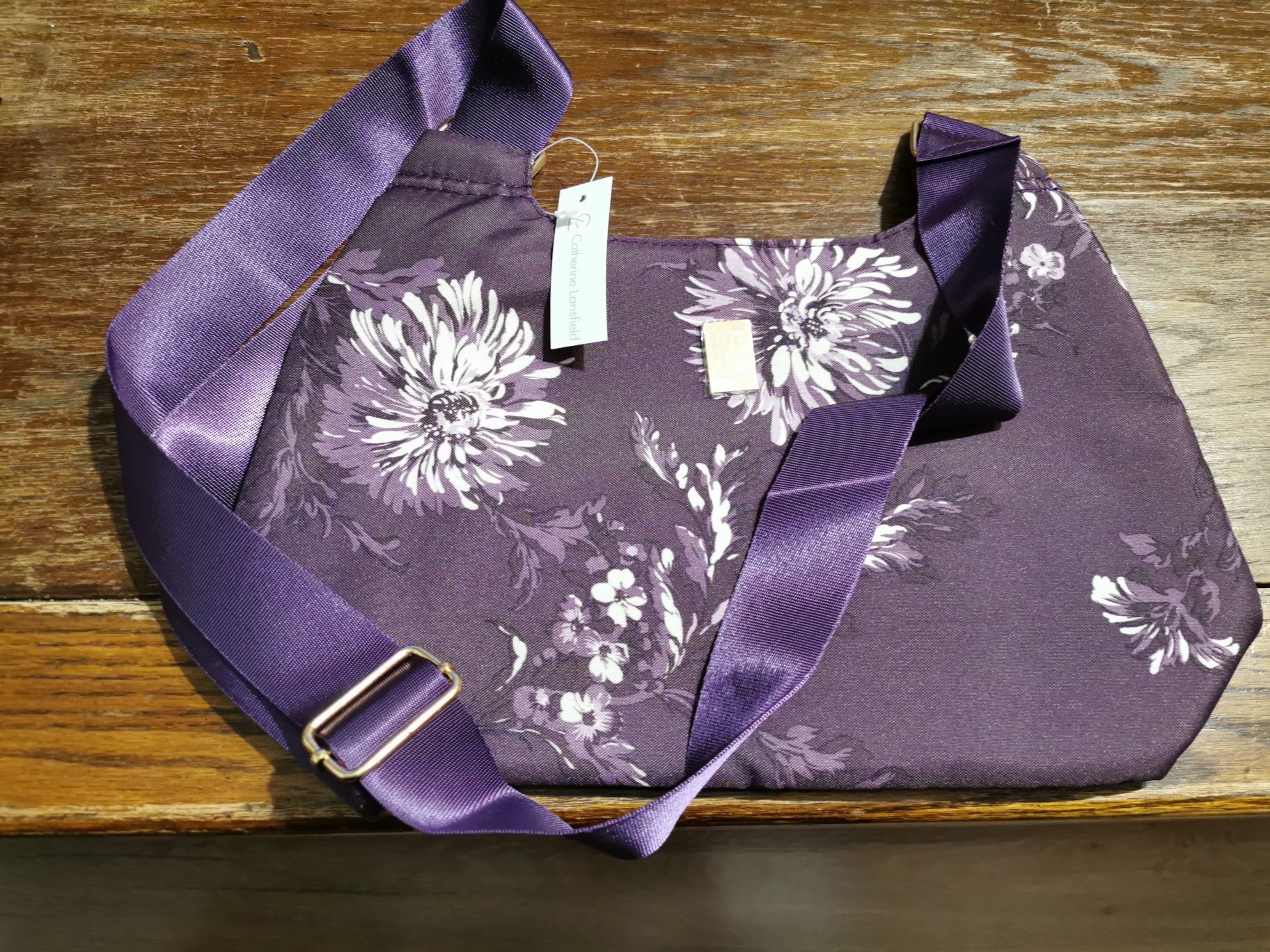 Fioletowa torebka w kwiaty