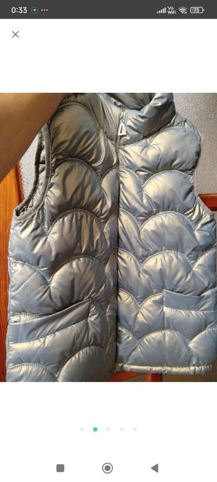 Жіноча жилєтка.,