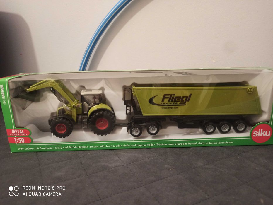 Nowy Traktor z koparka, wywrotka fliegl