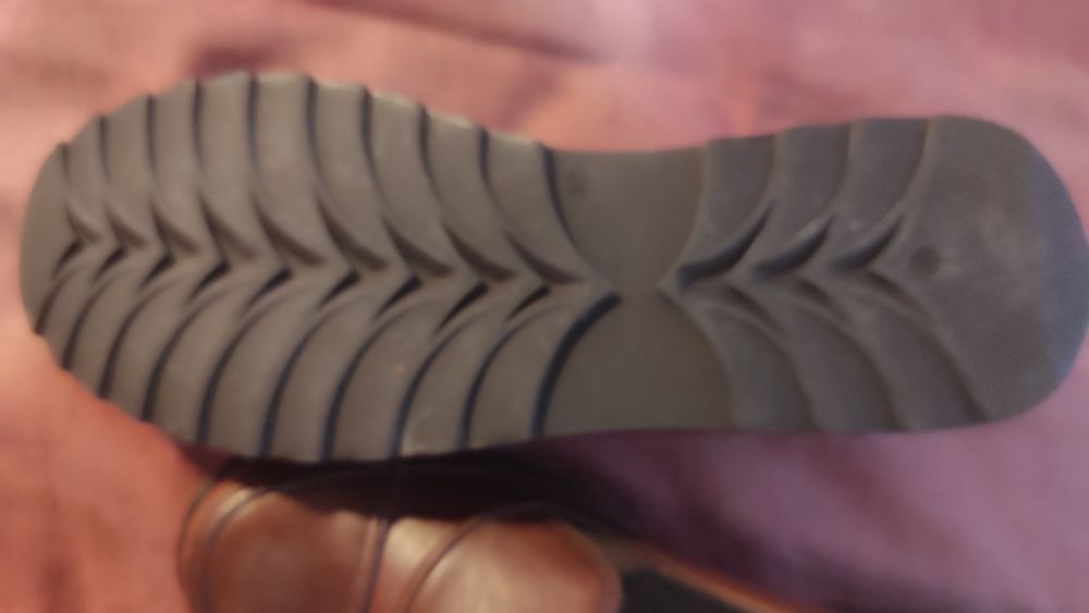 Sapatos de pele castanhos