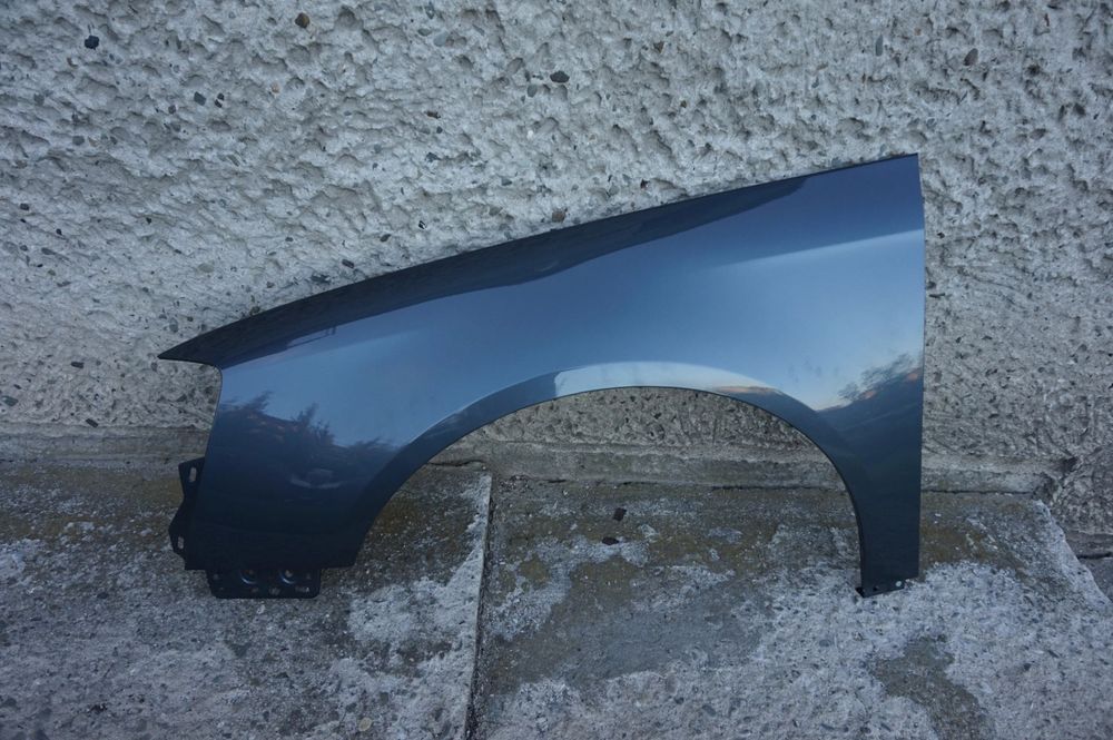 BŁOTNIK PRZEDNI LEWY VW PASSAT B6 LK7X