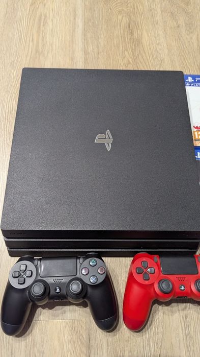 PS4 pro +2 pady + gry