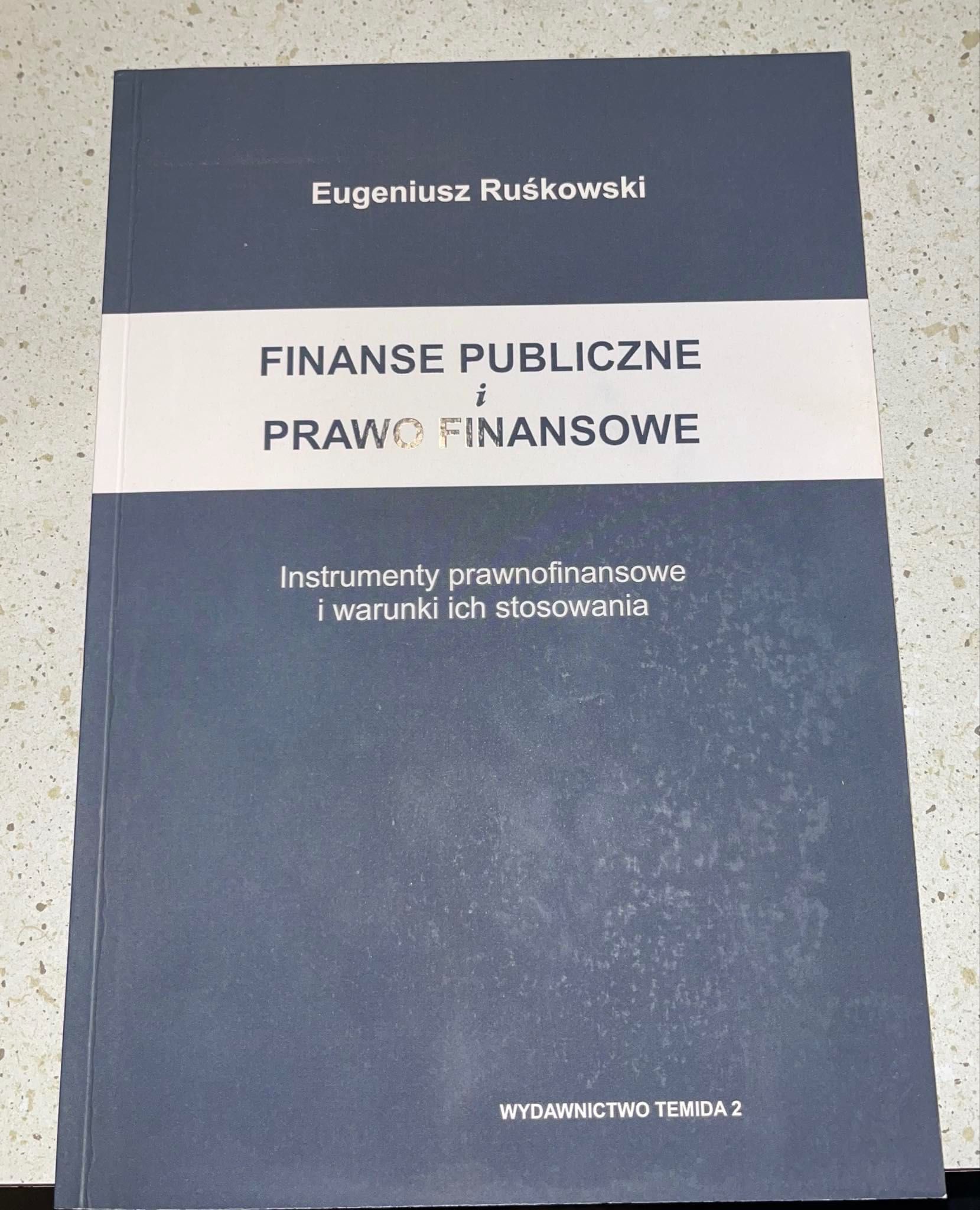 Finanse publiczne i prawo finansowe, Eugeniusz Ruśkowski
