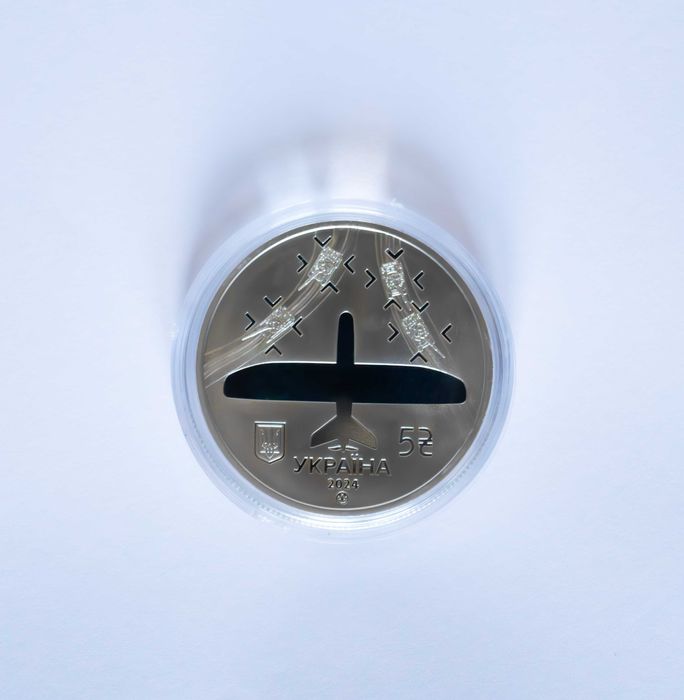 Монета "Українська бавовна. Лелека -100" у круглій капсулі