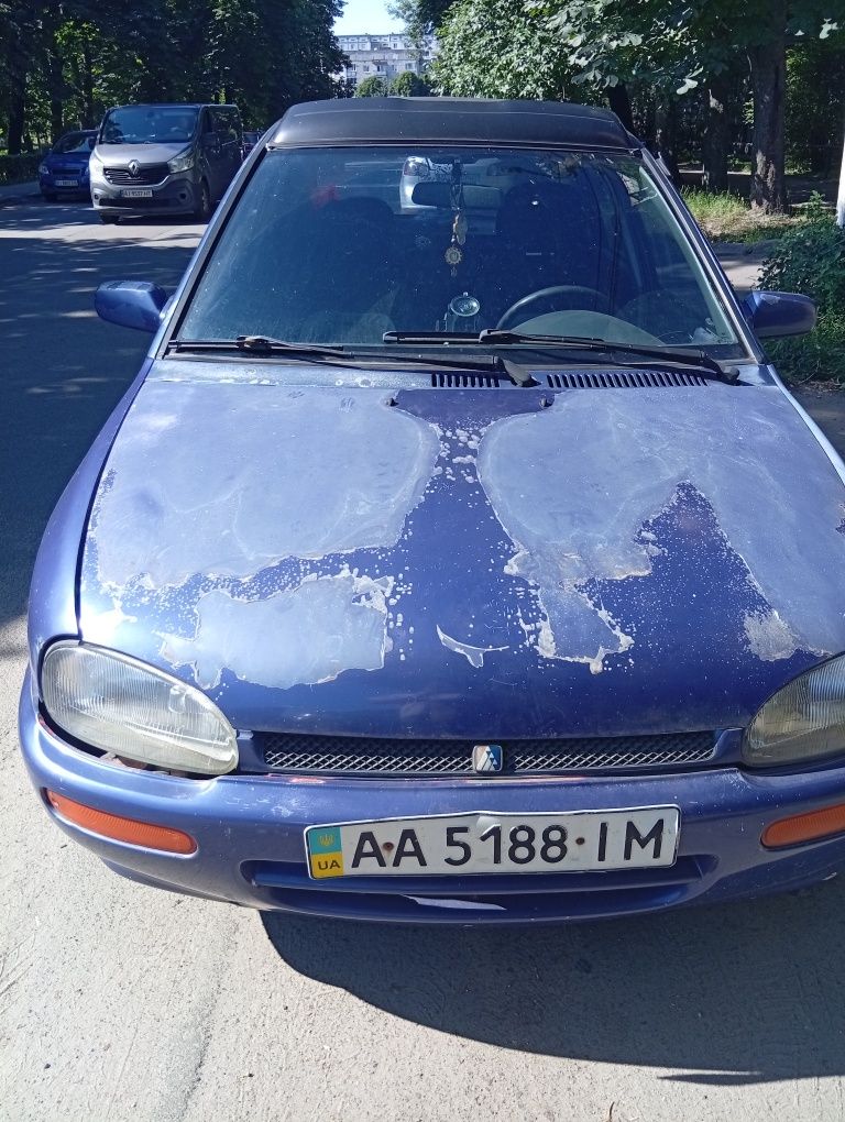 Мазда 121 кабріолет