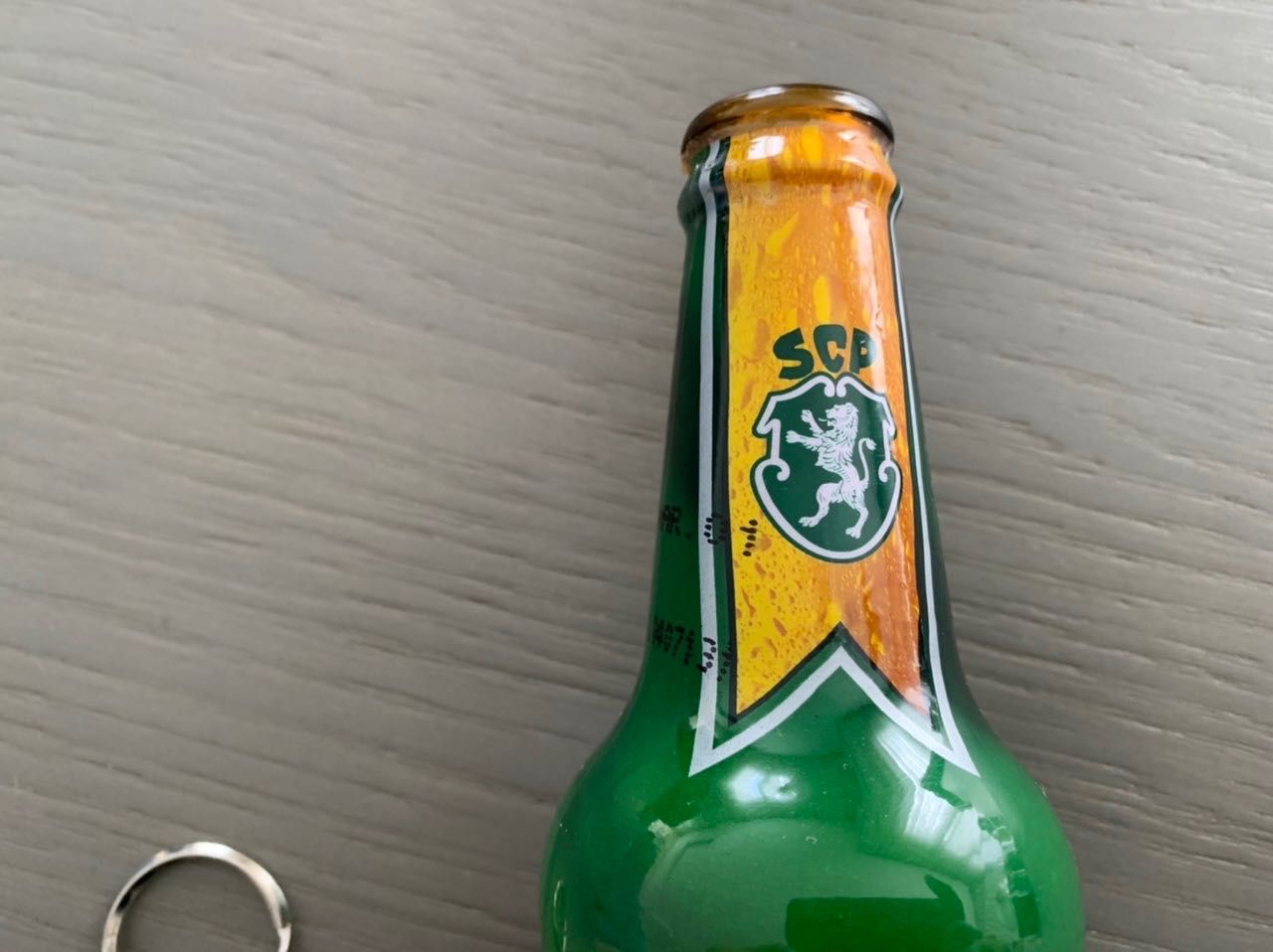 Garrafa de cerveja e Porta chaves do Sporting Clube de Portugal