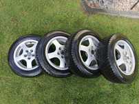 Opony wielosezonowe marki AUSTONE 185/60R14 Z ALUFELGAMI