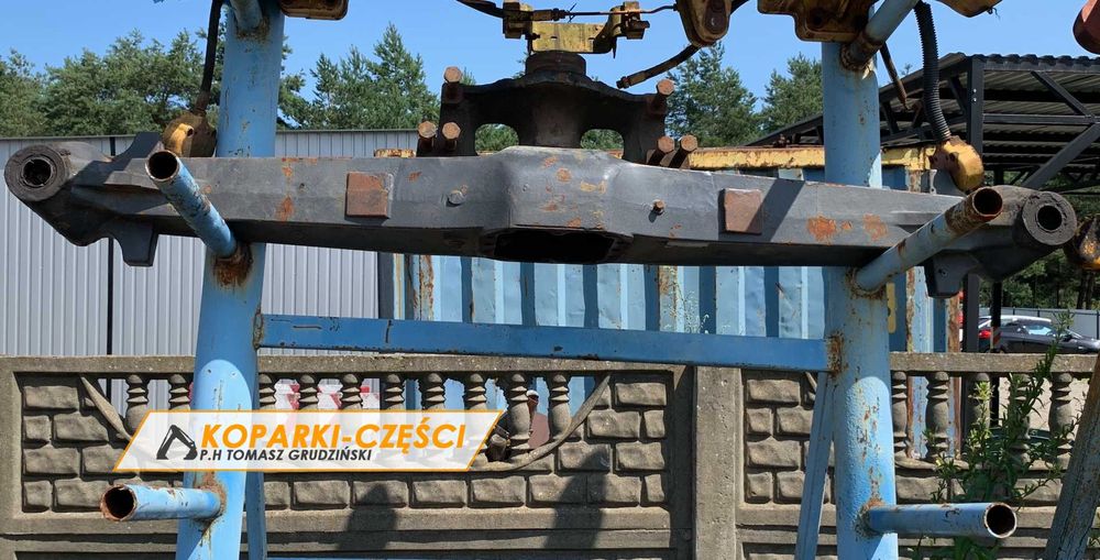 Belka mostu przedniego New Holland LB 115, CASE 695, Hitachi FB 200