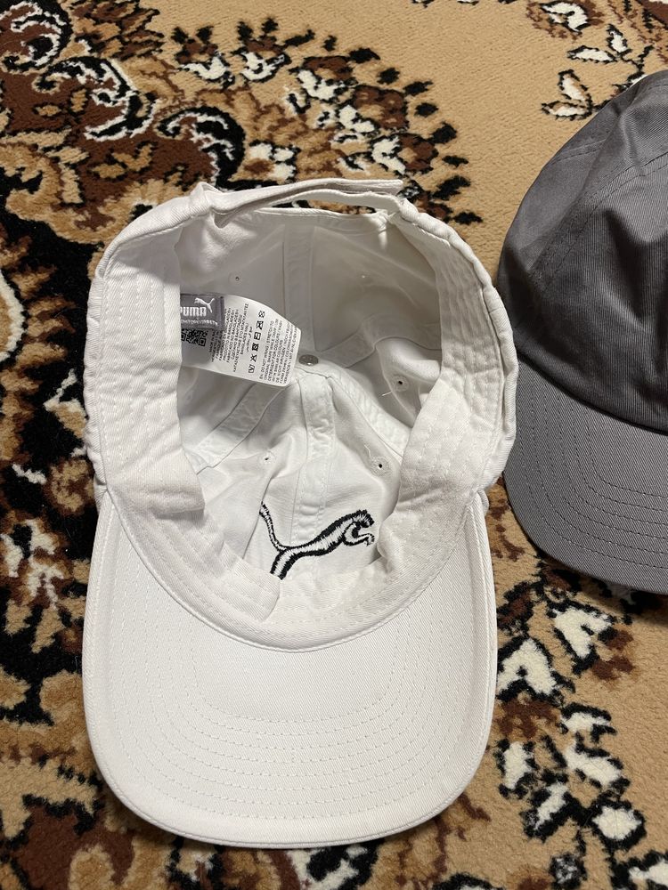 Кєпки Puma та Converse