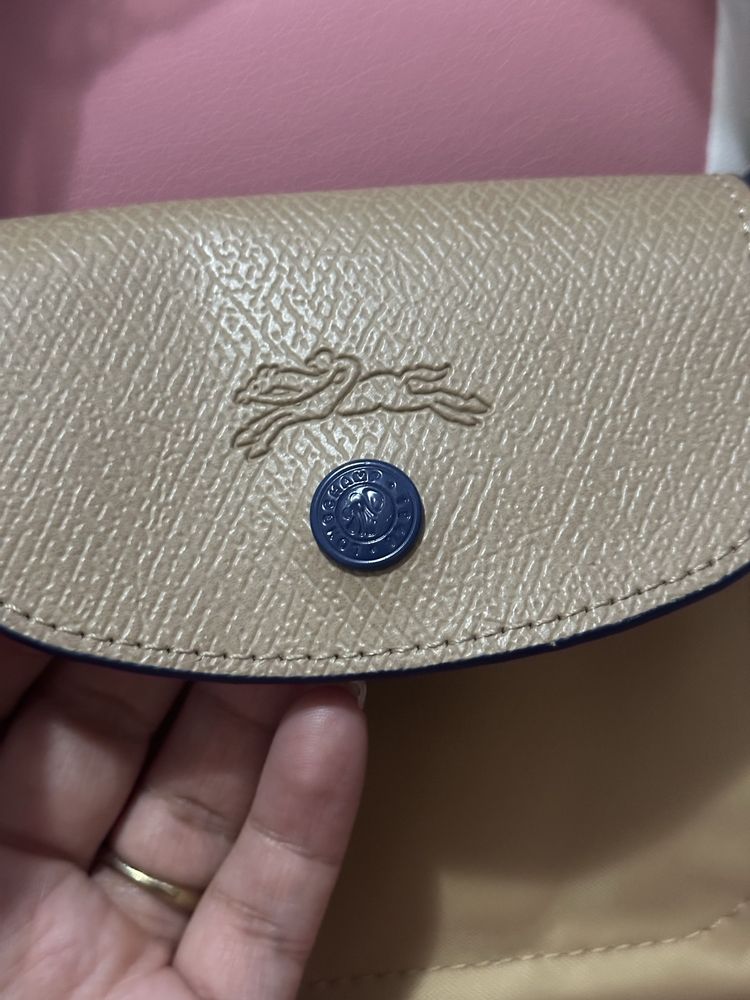 Mala Longchamp creme