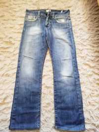 Damskie spodnie jeansowe Calvin Klein W28 stan bardzo dobry