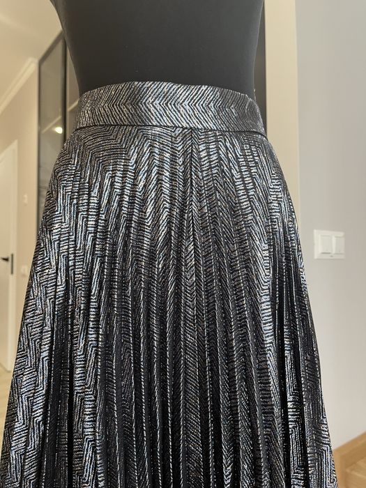 Спідниця міді з плесіровкою