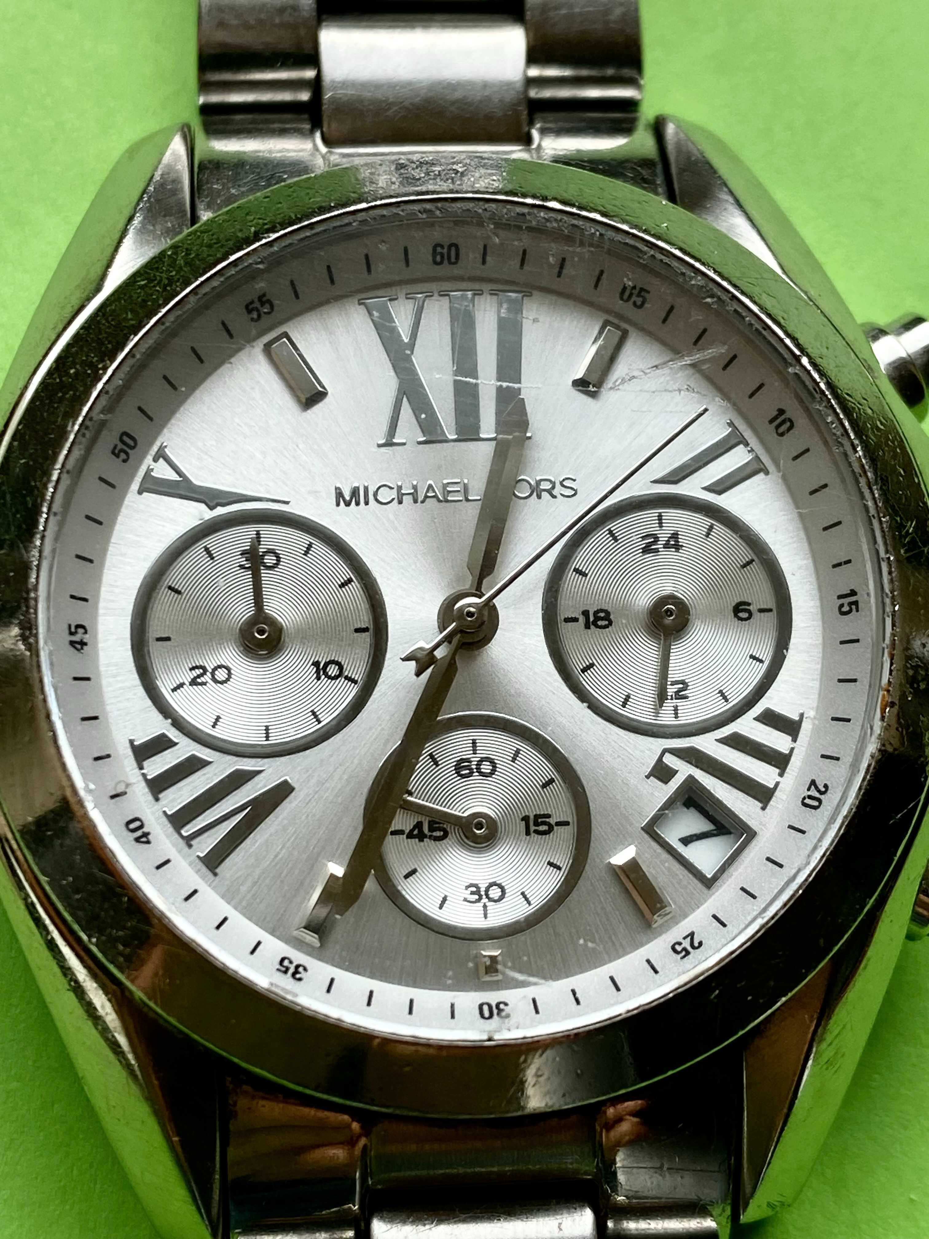 Жіночий наручний електронний годинник марки Michael Kors