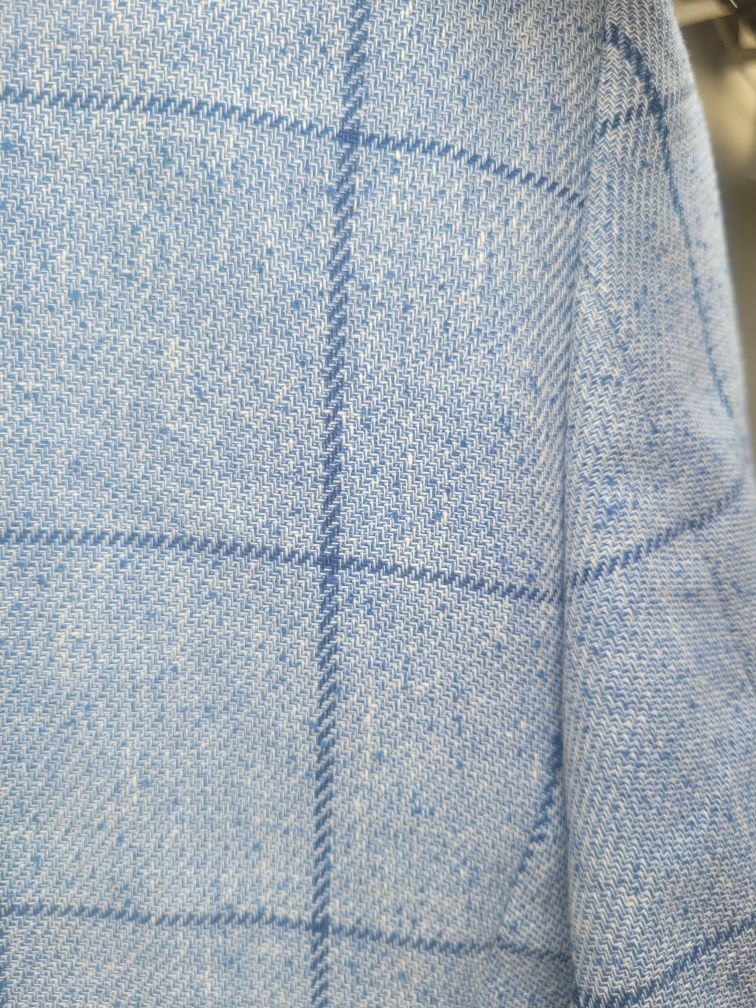 Новый стильный голубой пиджак в крупную клетку 34р.