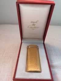 Isqueiro de ouro da Must de Cartier