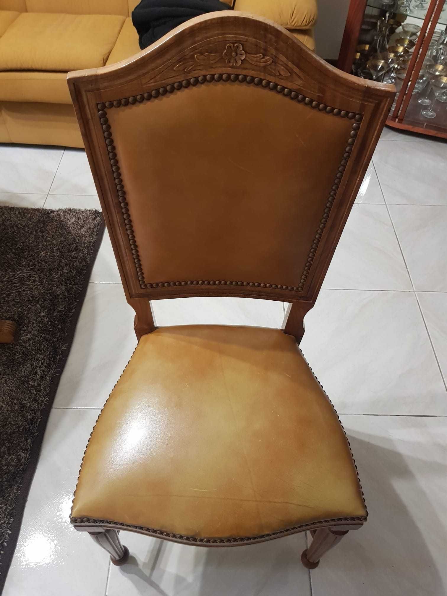 Vendo mesa de sala com 6 cadeiras em pele e 2 bancos de bar..