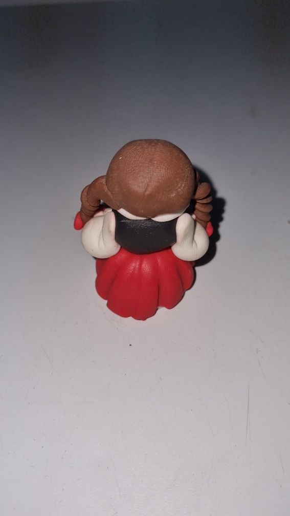 Boneca miniatura