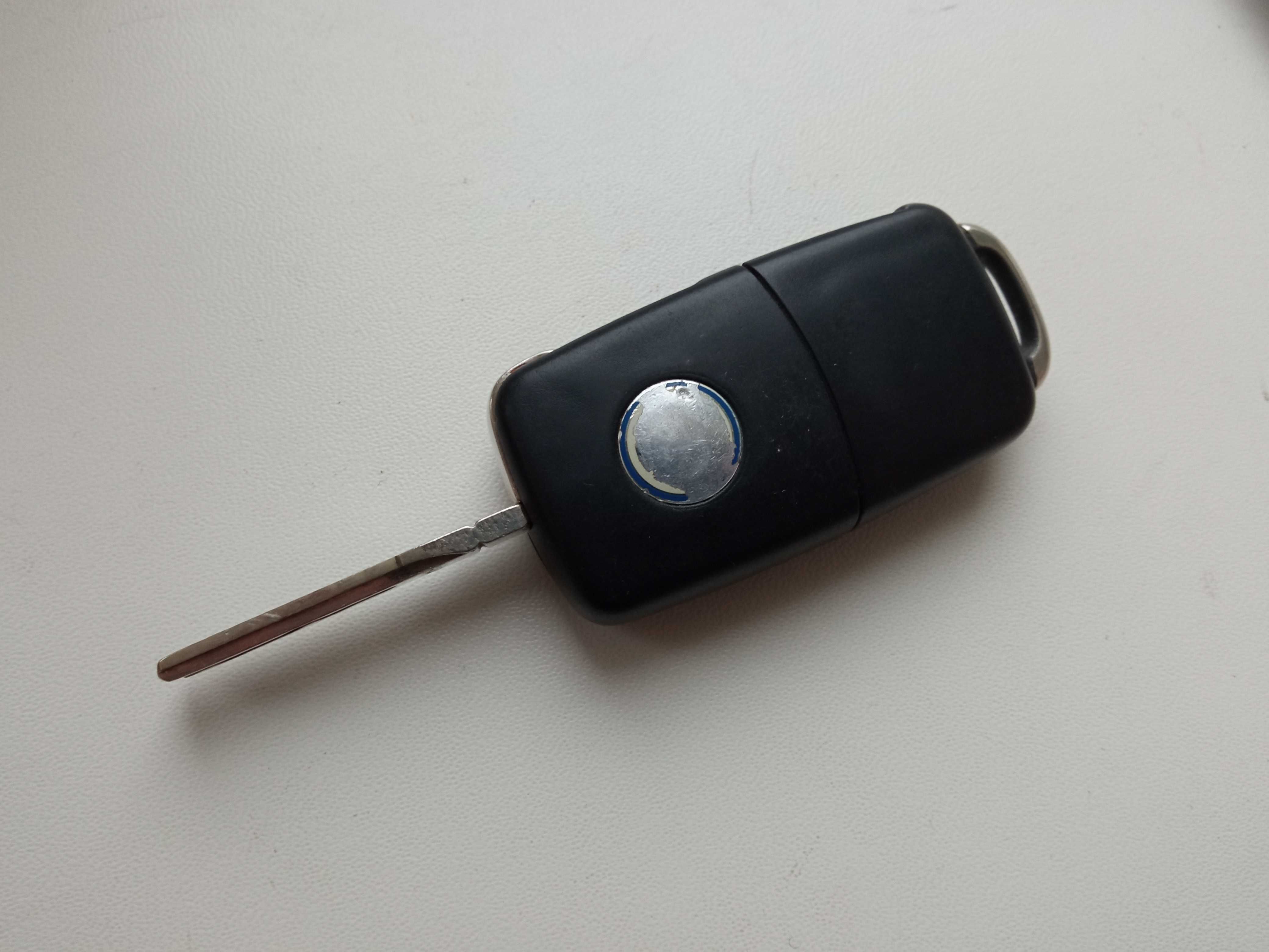 Оригинальный оригинал заводской родной ключ VW на три кнопки 434 mHz