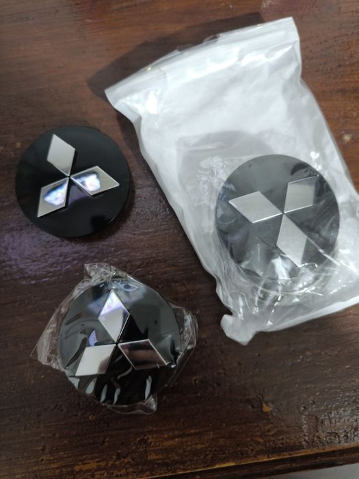 4 Tampas de centro de roda Mitsubishi