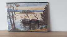 Reprodukcja (druk) obrazu w antyramie o wymiarach 40x30 cm.