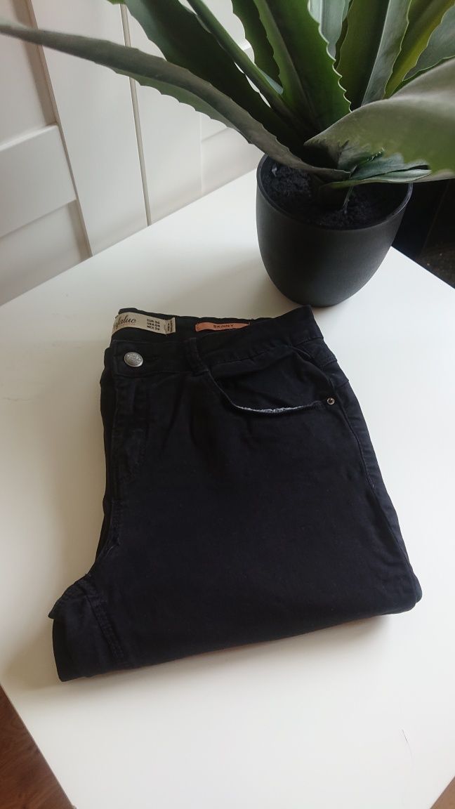 Spodnie jeansowe dżinsowe rurki damskie z niskim stanem marki Zara