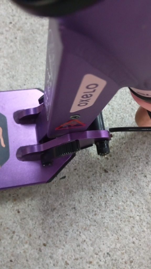 Trotinete lilas como nova