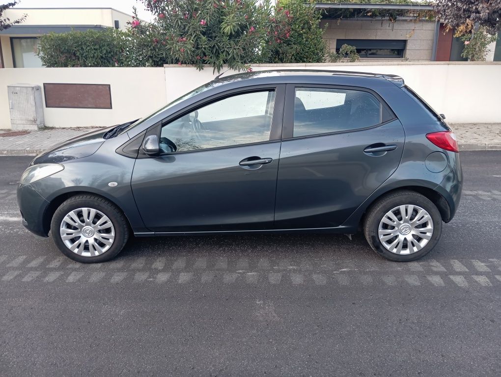 Mazda 2 1.3 gasolina 160mil KMS reais com AC 2010